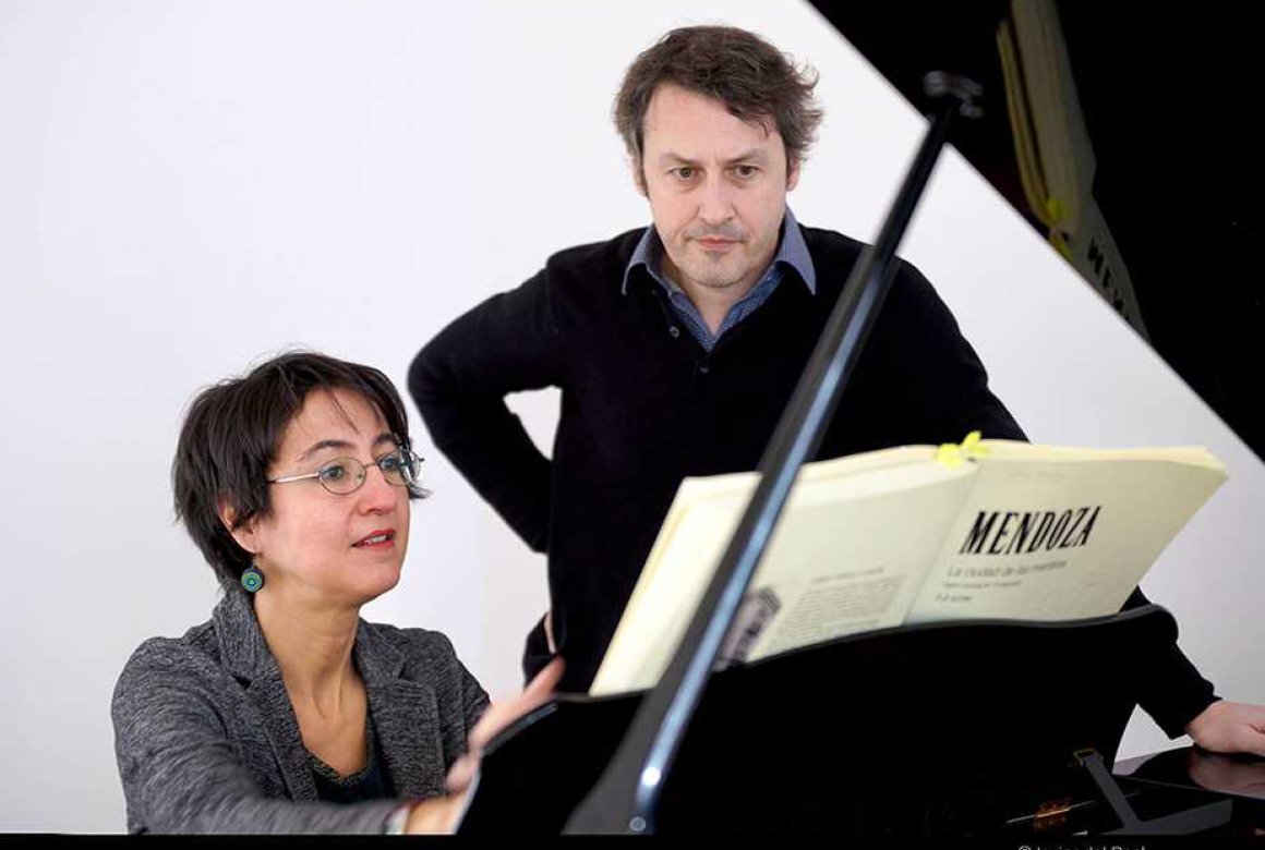 Elena Mendoza and Matthias Rebstock reading score